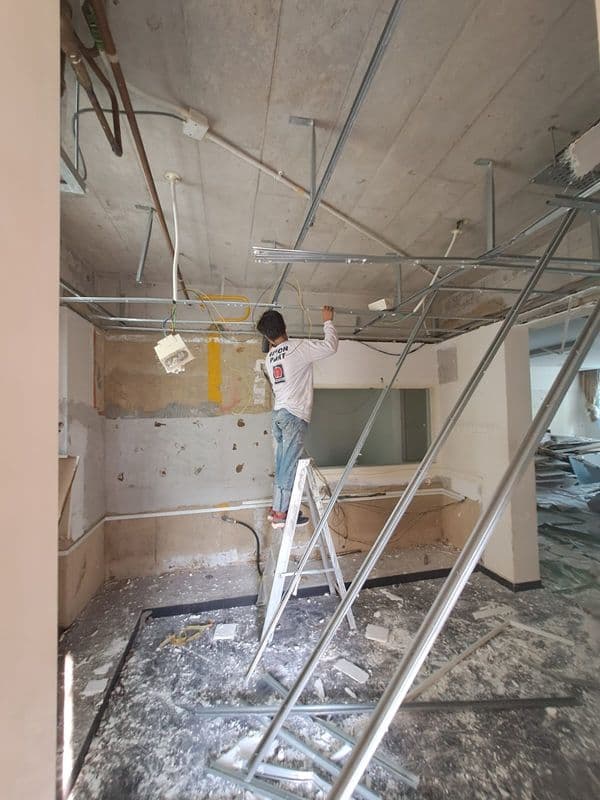 Professional false ceiling and wall cornice hacking services Singapore