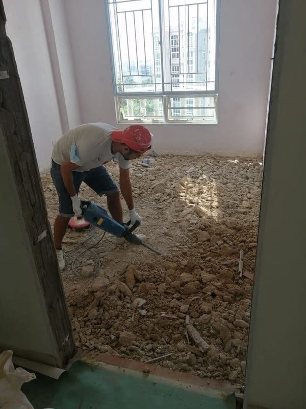 Our floor hacking & tile removal process